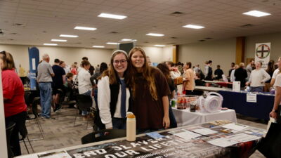 A room full of students at an Activities Fair