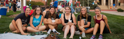 Students gathered on the Weller front lawn for Dinner and a Movie