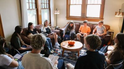 The Micah scholars meet to discuss as a group.
