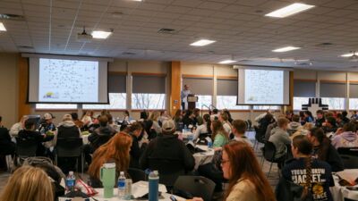 AG students using a tarp for a demonstration