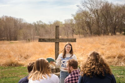 Students in a Bible study at the outdoor chapel. 