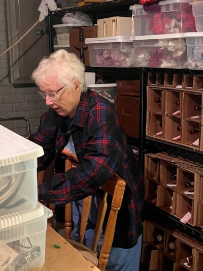 Clark-Smith packs wine to ship to California.